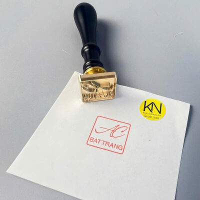 Dấu đồng cán gỗ