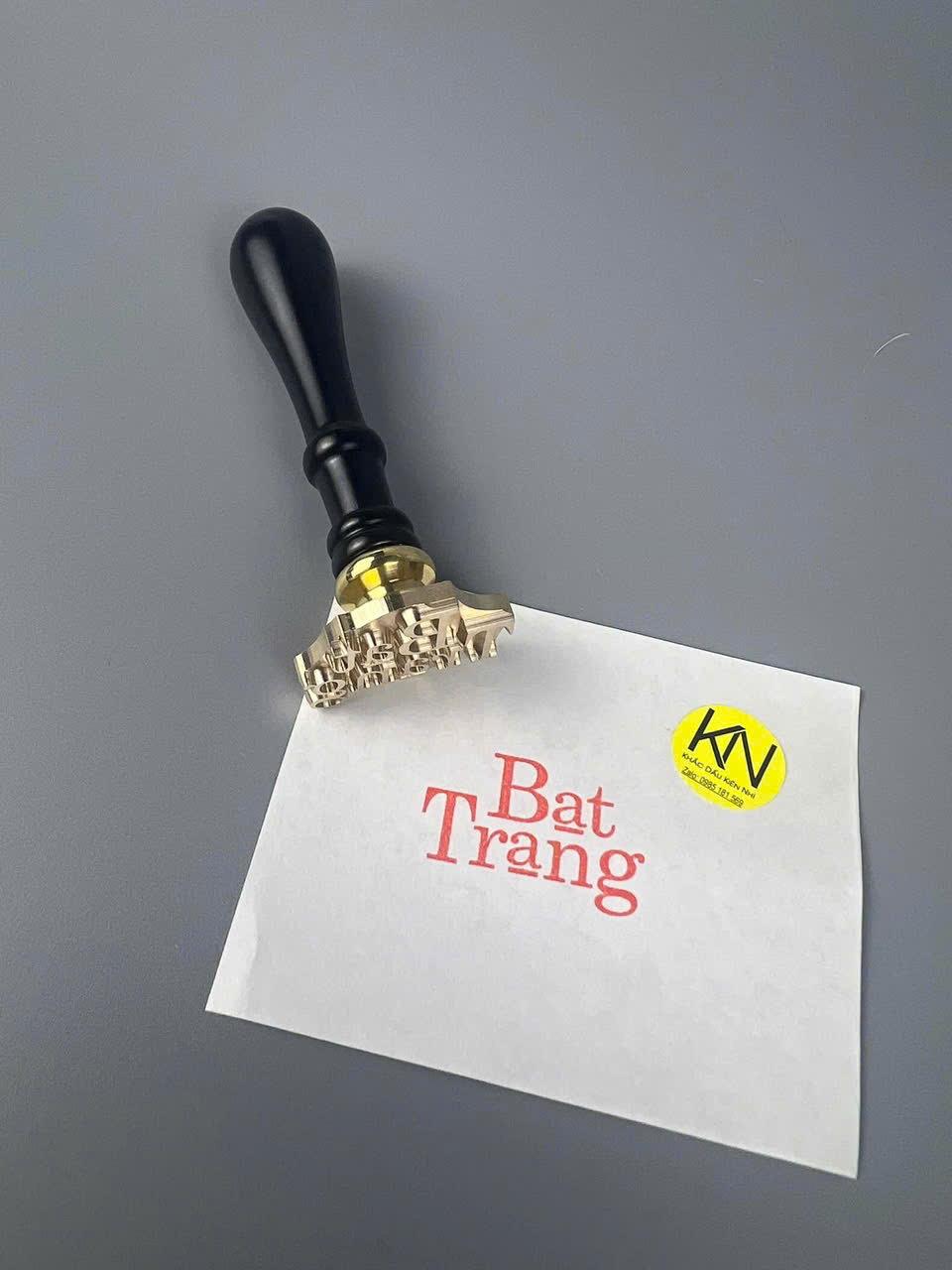 Dấu đồng cán gỗ