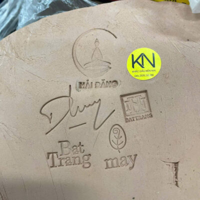 Dấu đồng in gốm sứ trước nung