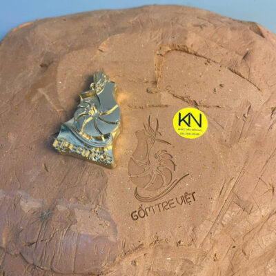 Dấu đồng in gốm sứ trước nung